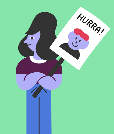 Person som håller ett plakat med texten "Hurra!" och ett leende ansikte