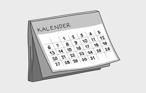 Bordskalender med månadsöversikt och numrerade datum.