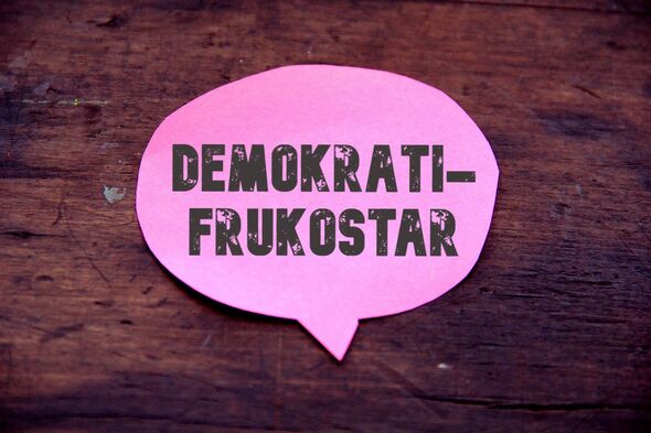 En rosa pratbubbla med ordet demokratifrukostar i.