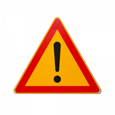 Varningsskylt med utropstecken på gul bakgrund.